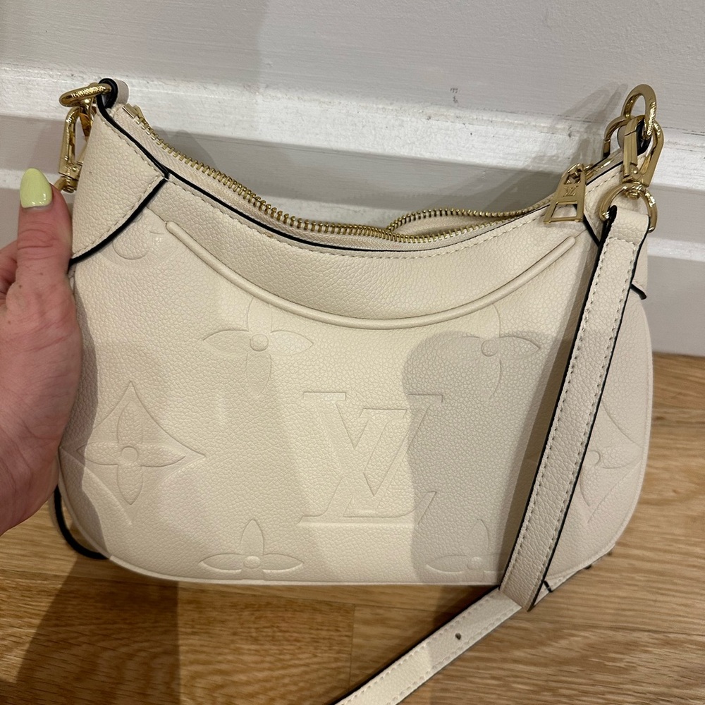 White faux leather Louis Vuitton shoulder / crossbody purse with gold hardware